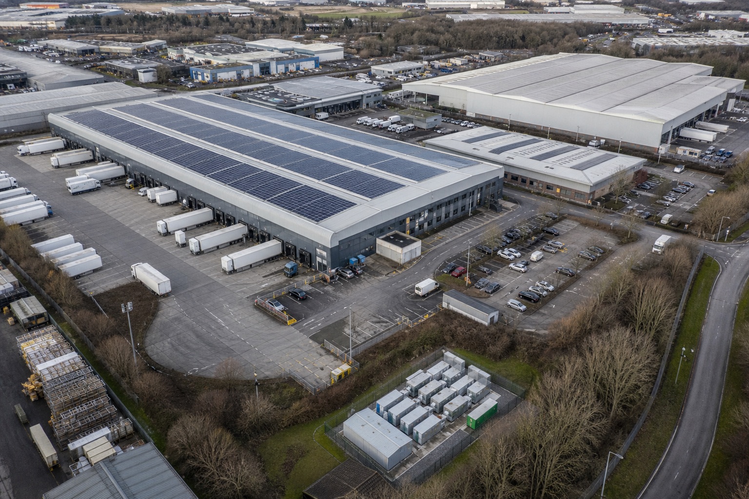 Aerial view of an industrial distribution campus with rooftop solar